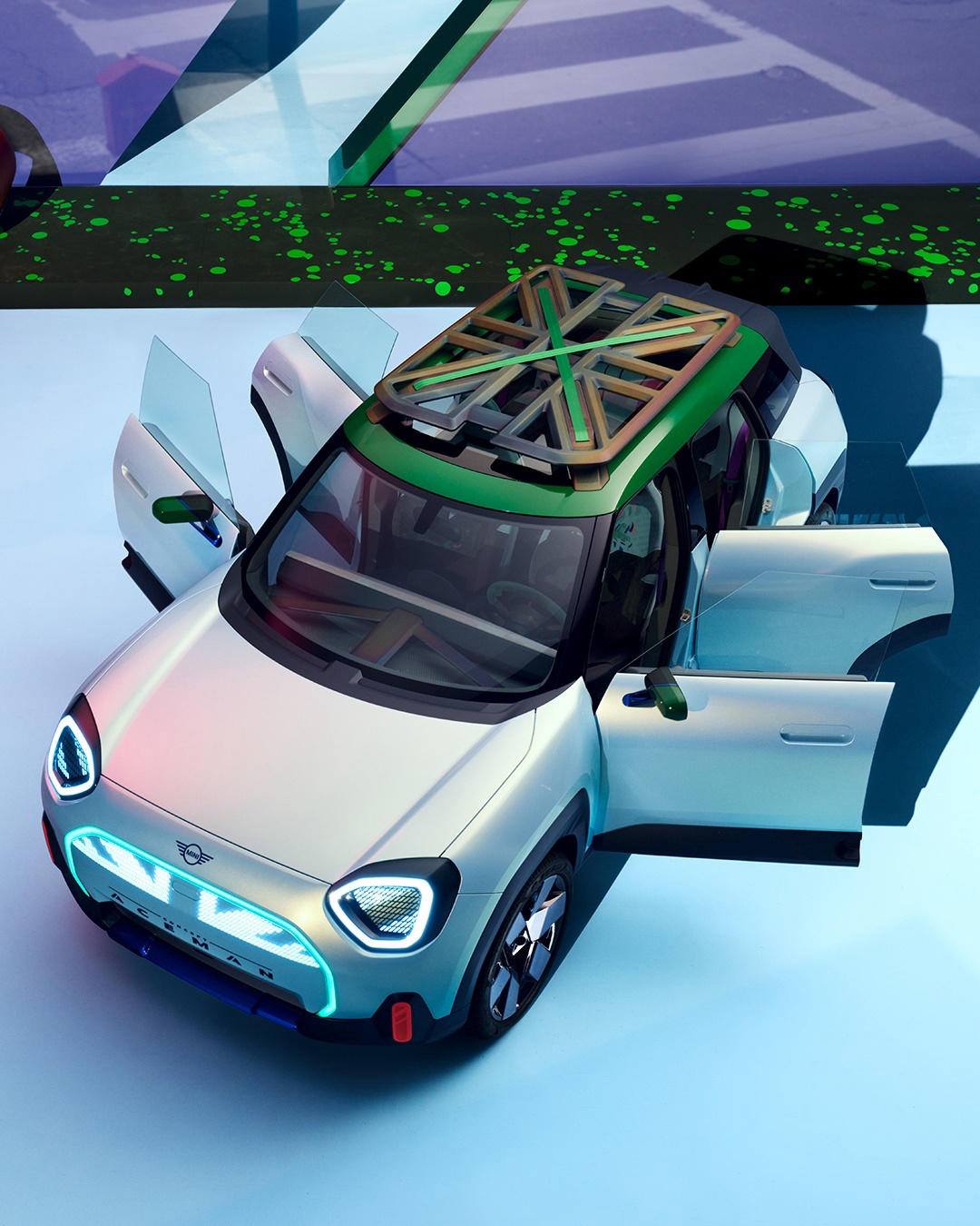 MINI - From its Icy Sunglow Green exterior to its MINI-malistic interior, swipe to explore the iconi